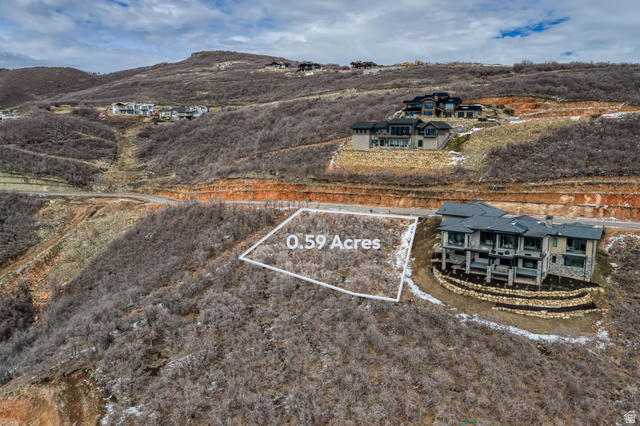 1982 East Outlaw Road, Unit 42 Kamas, UT 84036 - Photo 10 of 15 Aerial view of property's location featuring property boundaries highlighted and a mountain backdrop