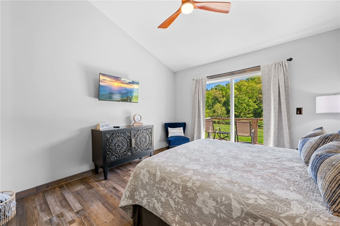 634-636 Watauga River Road Sugar Grove, NC 28679 - Photo 28 of 50 a bed room with a bed and a window