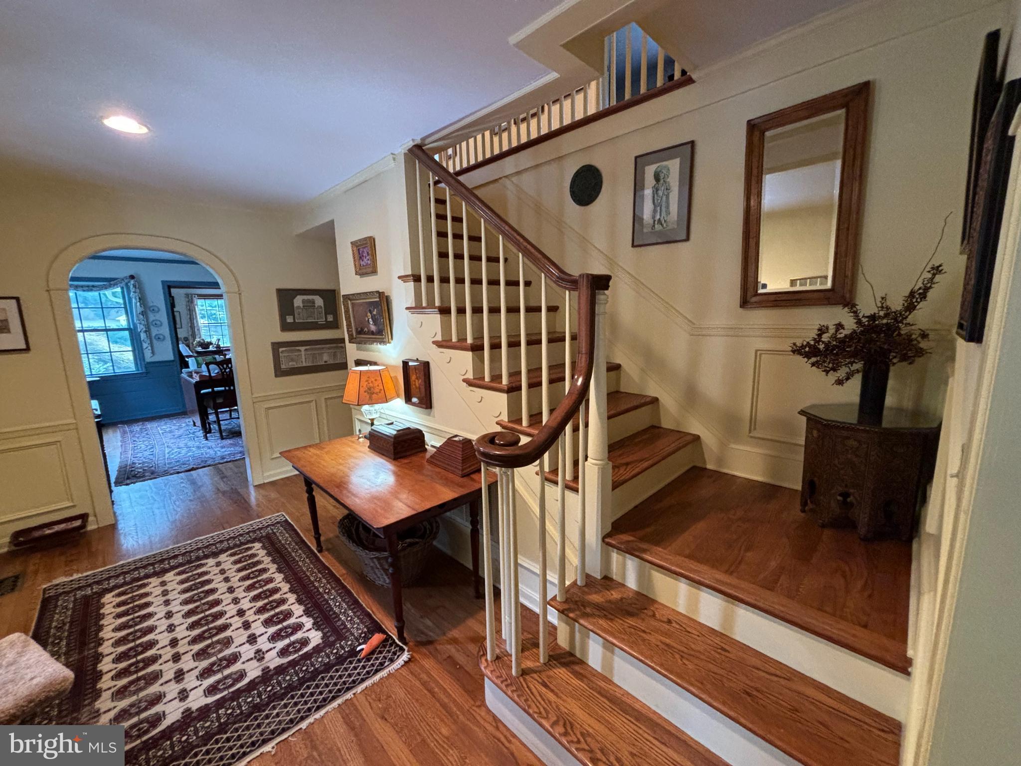6680 Peachblossom Point Road Easton, MD 21601 - Photo 26 of 35 a living room with furniture and a rug