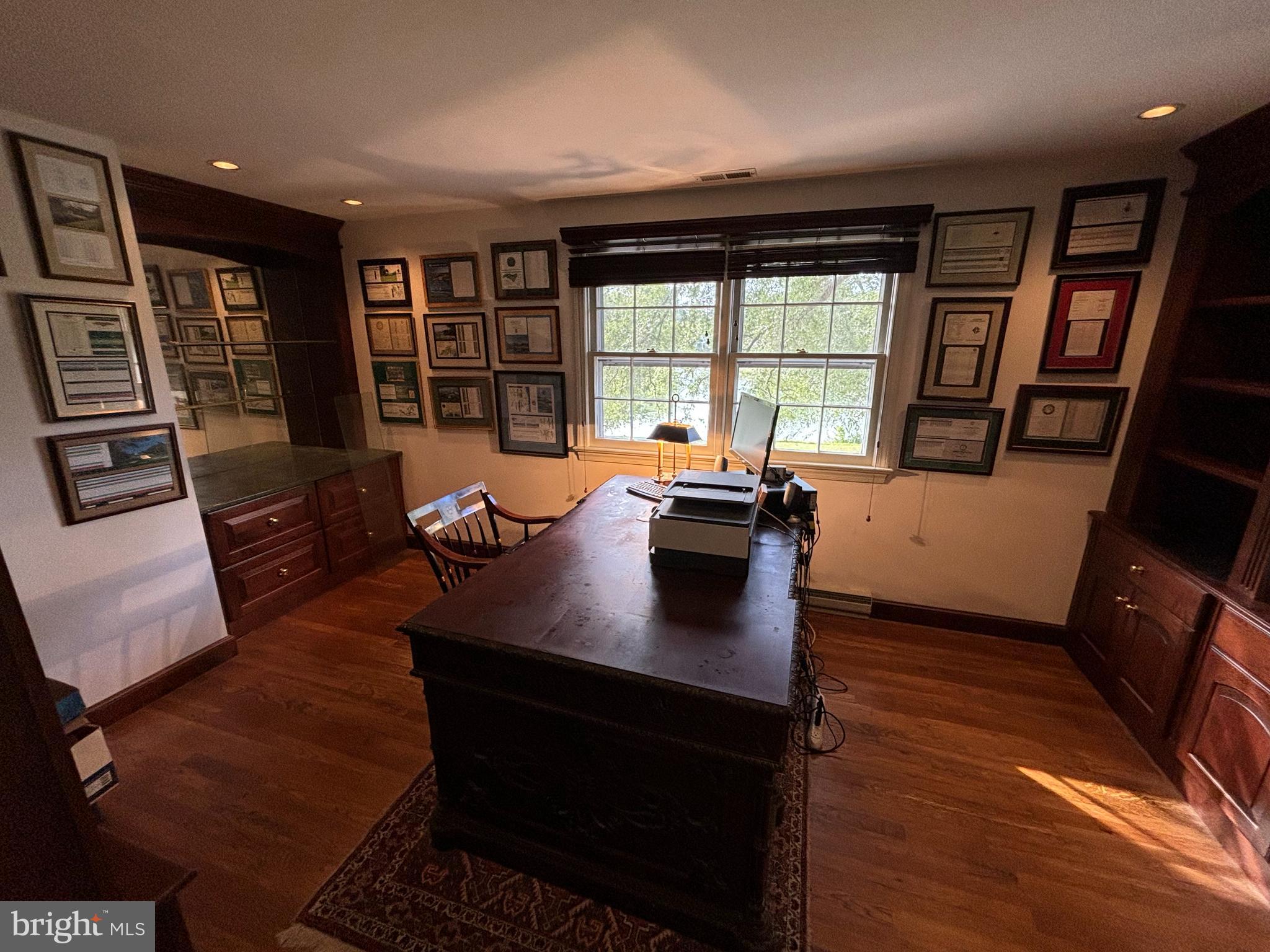 6680 Peachblossom Point Road Easton, MD 21601 - Photo 30 of 35 a view of a livingroom with furniture window and wooden floor