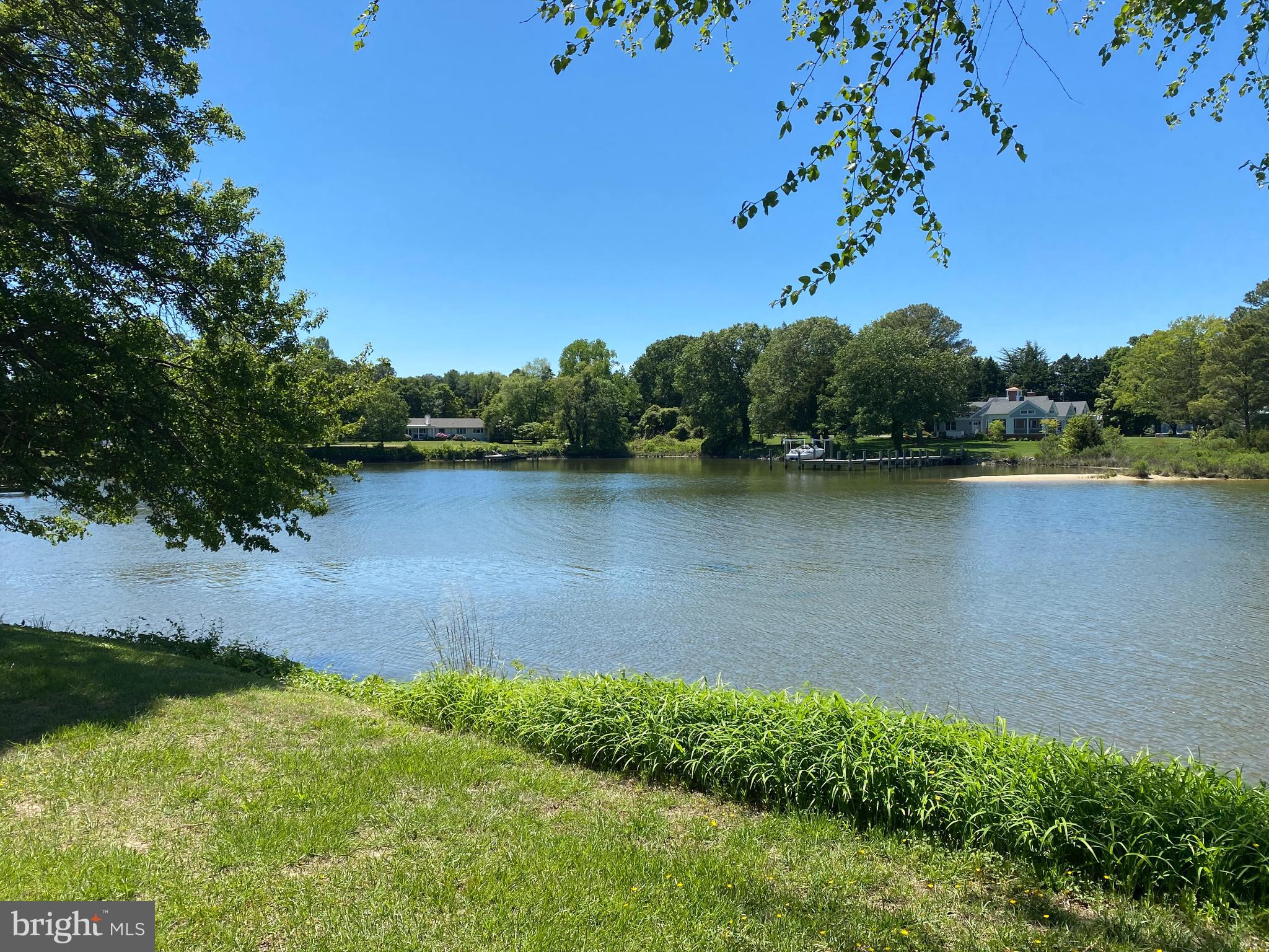 6680 Peachblossom Point Road Easton, MD 21601 - Photo 7 of 35 an aerial view of a residential houses with outdoor space and lake view