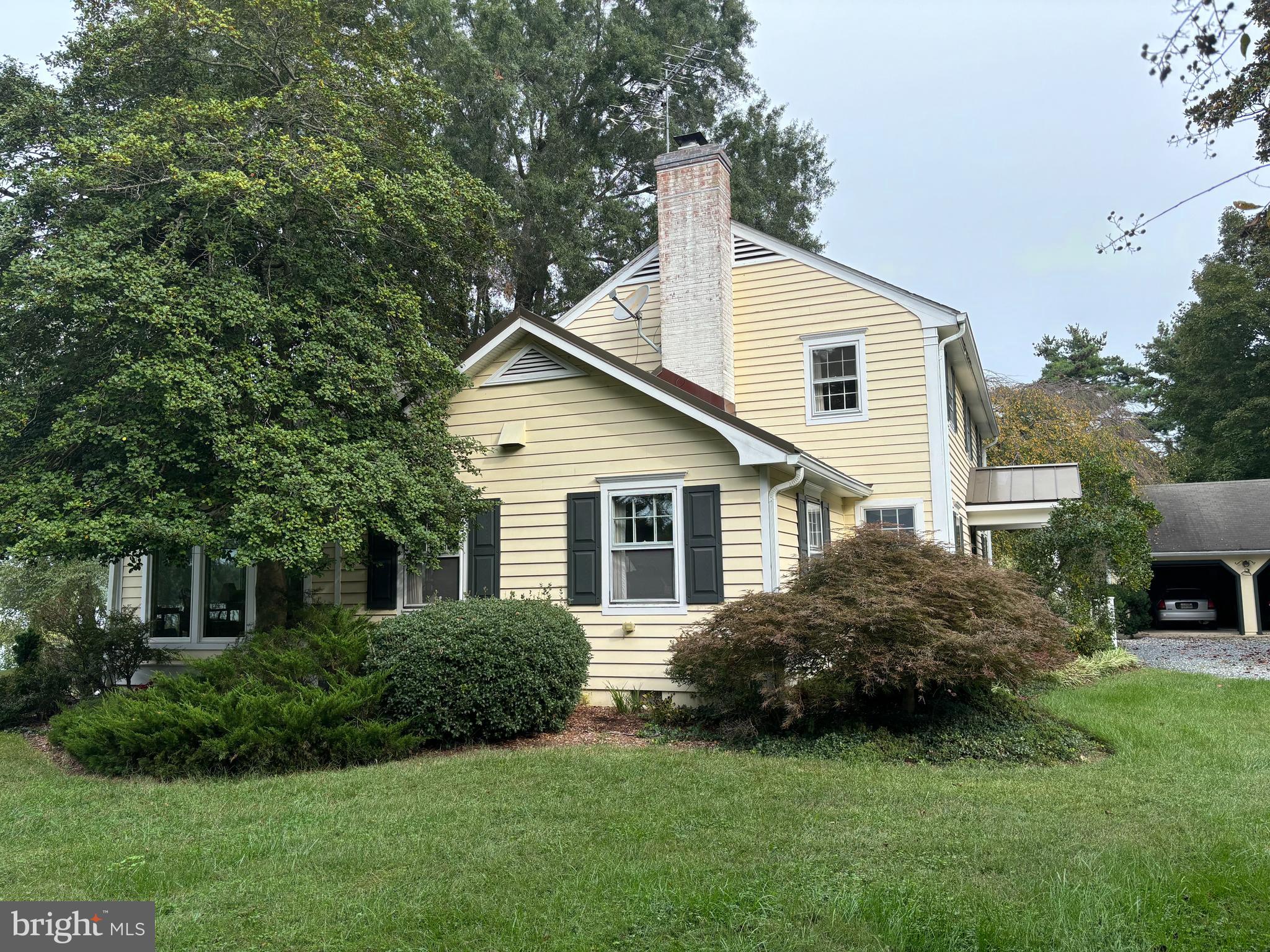 6680 Peachblossom Point Road Easton, MD 21601 - Photo 10 of 35 a view of a house with backyard and garden