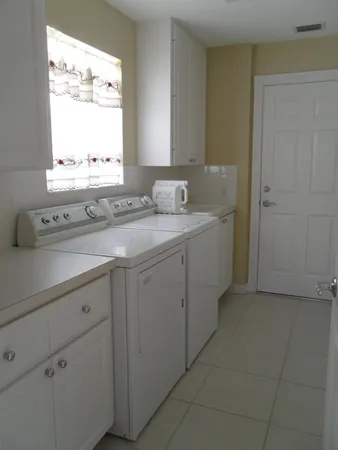 a balcony with furniture and a garden