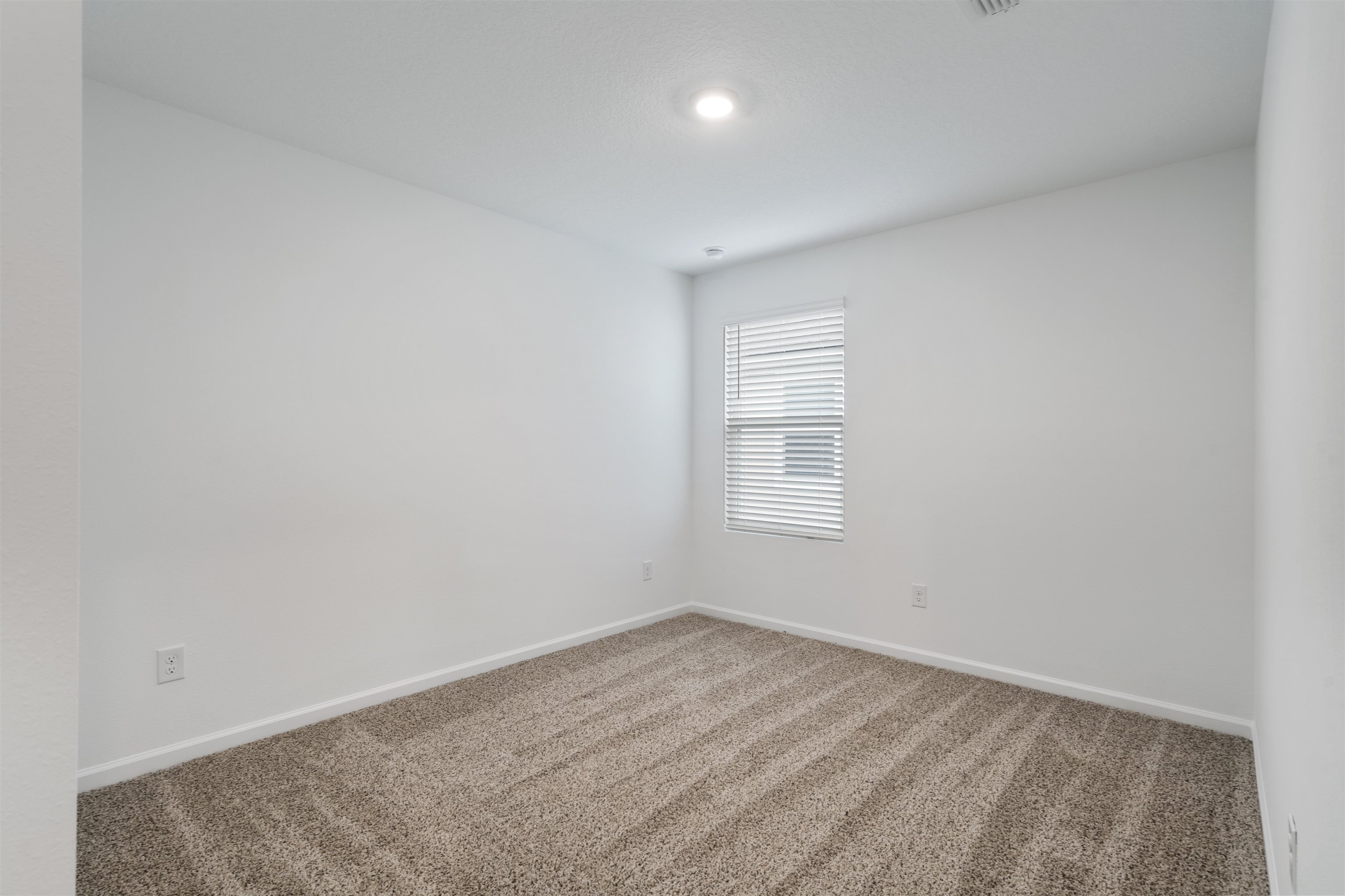 861 Orellana Road St. Augustine, FL 32084 - Photo 16 of 40 an empty room with a empty space and window