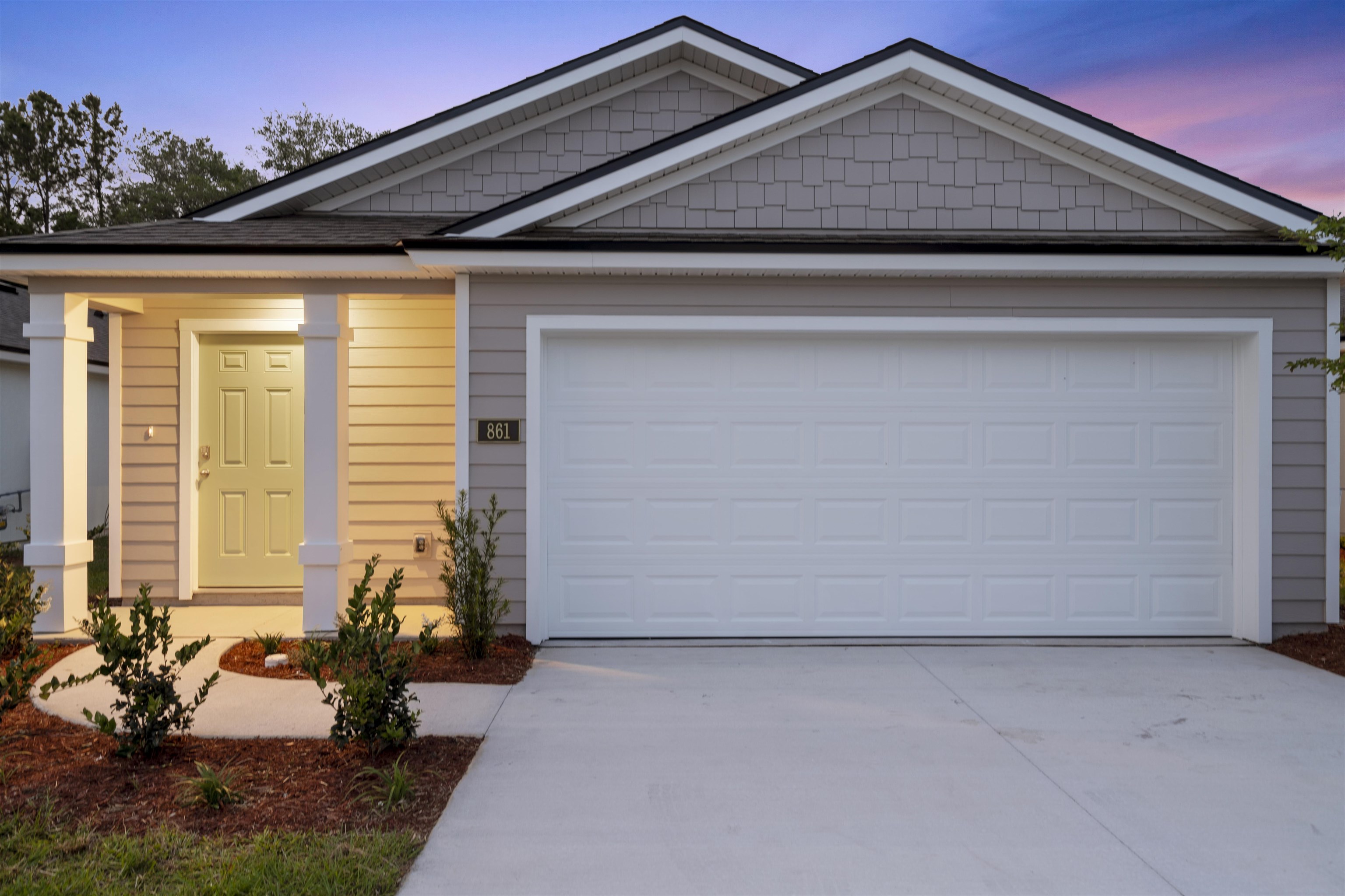 861 Orellana Road St. Augustine, FL 32084 - Photo 22 of 40 a front view of a house with a yard