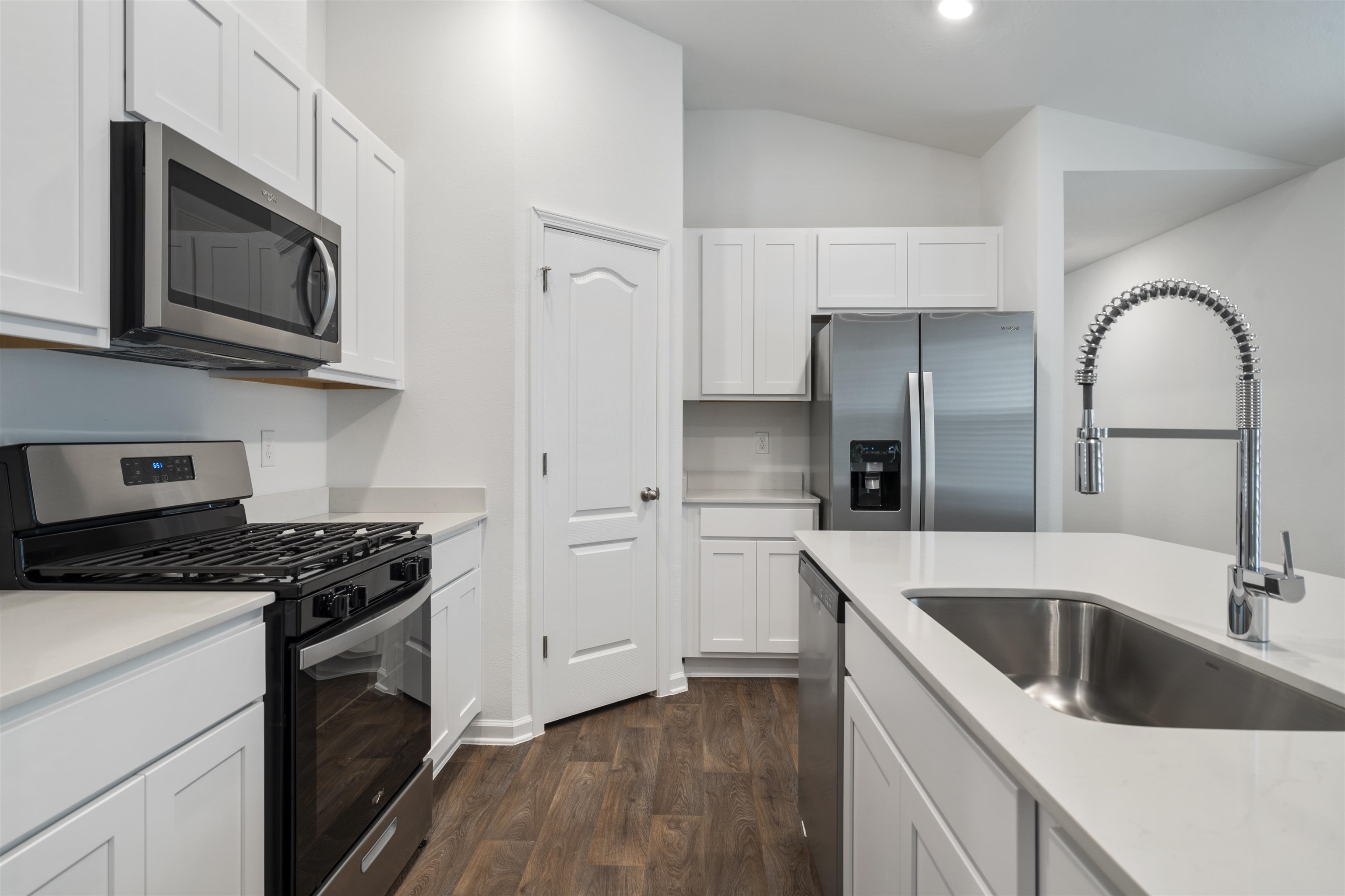 861 Orellana Road St. Augustine, FL 32084 - Photo 5 of 40 a kitchen with stainless steel appliances granite countertop a sink stove and refrigerator