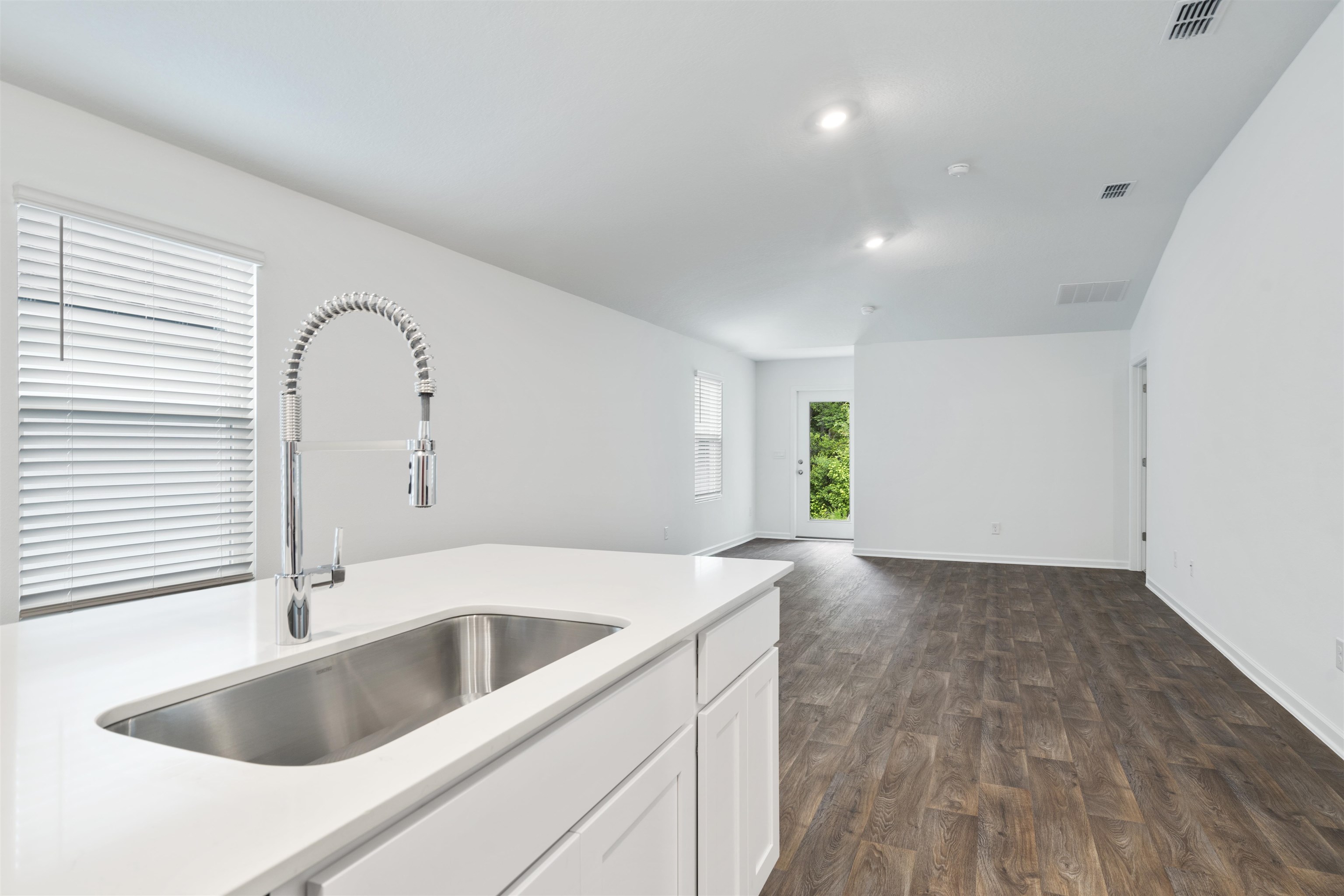 861 Orellana Road St. Augustine, FL 32084 - Photo 7 of 40 a kitchen with a sink and cabinets