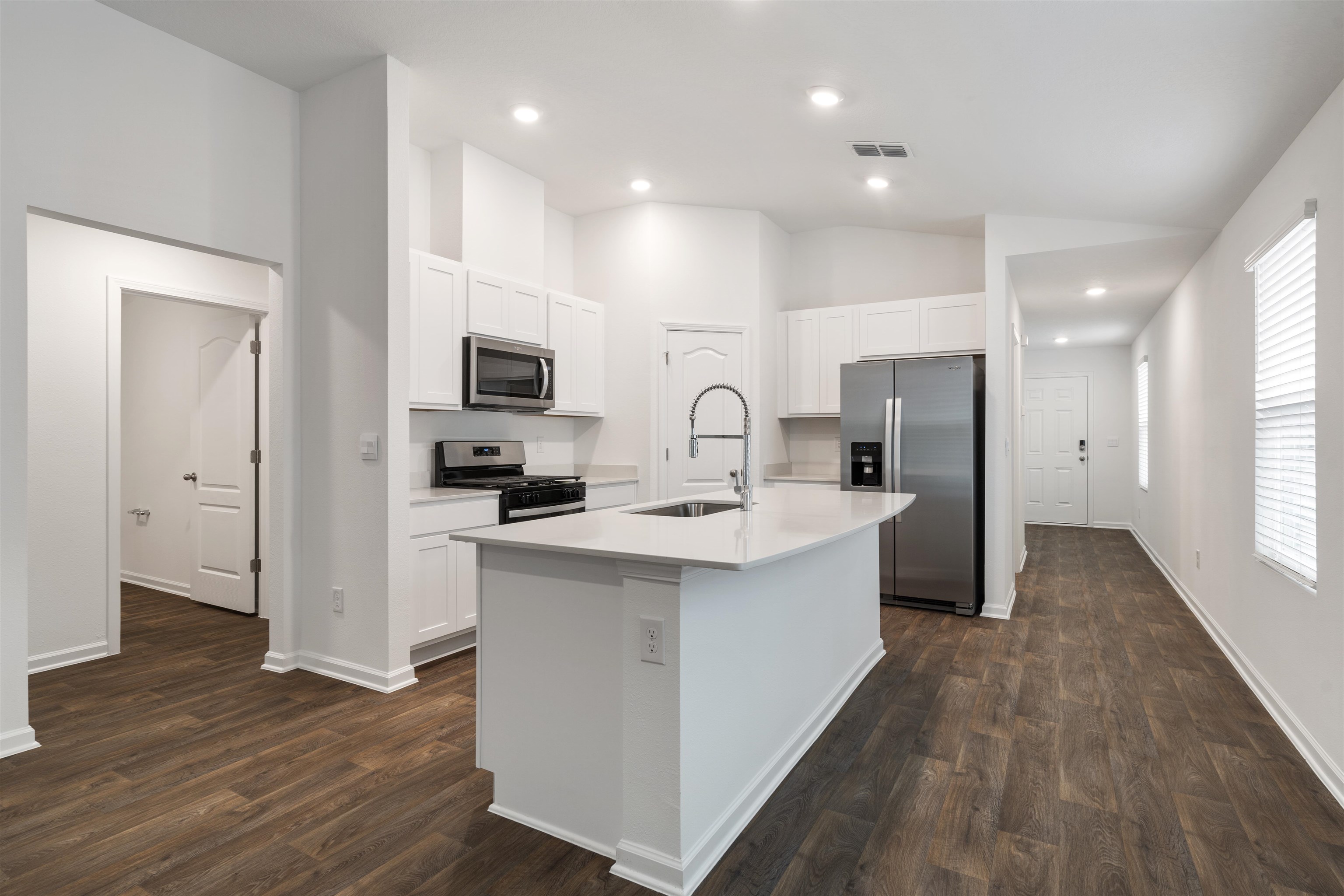 861 Orellana Road St. Augustine, FL 32084 - Photo 8 of 40 a kitchen with a sink and a refrigerator