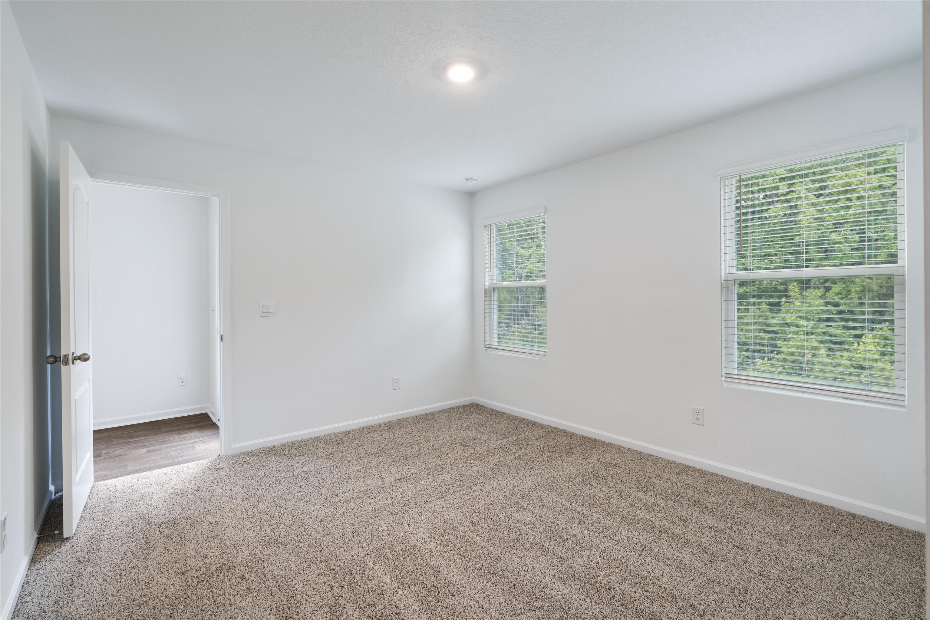 861 Orellana Road St. Augustine, FL 32084 - Photo 10 of 40 an empty room with windows