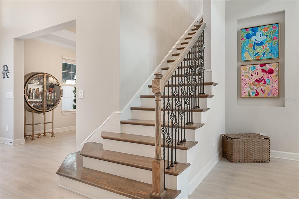 10175 Brocksport Circle Gotha, FL 34734 - Photo 29 of 54 a view of entryway with stairs and wooden floor