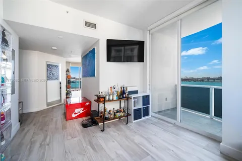 a view of a living room and dining room