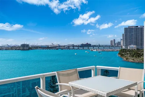 a view of a balcony with city view