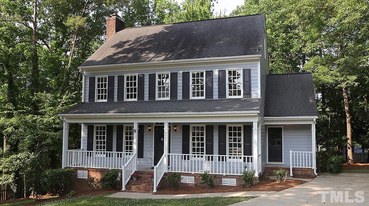 4505 Fortingale Circle Raleigh, NC 27613 - Photo 1 of 14 a front view of a house with a yard