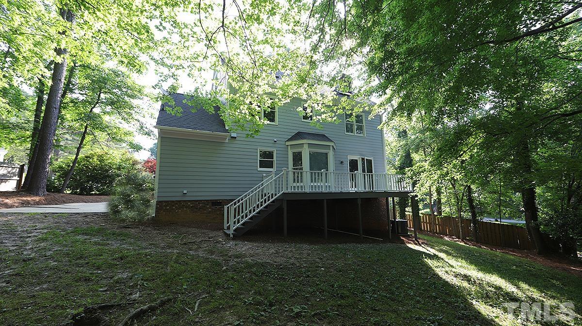 4505 Fortingale Circle Raleigh, NC 27613 - Photo 14 of 14 a front view of a house with a yard