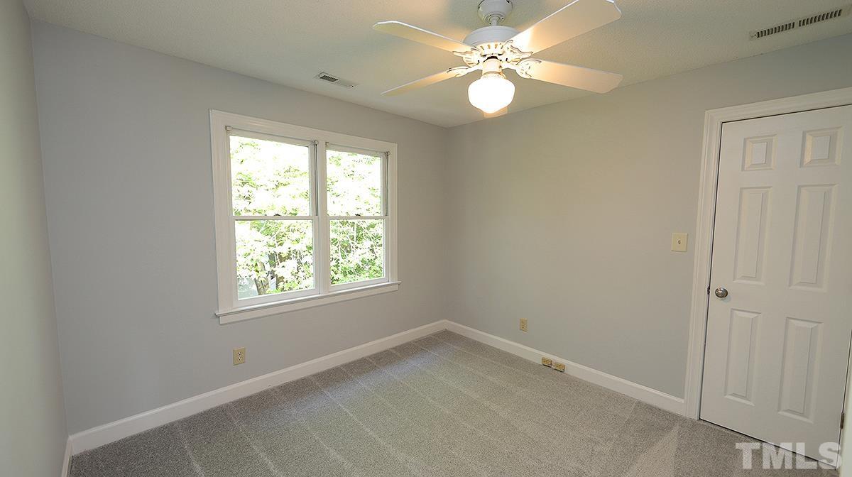 4505 Fortingale Circle Raleigh, NC 27613 - Photo 10 of 14 an empty room with a window