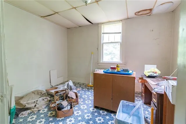 a room with furniture and a window