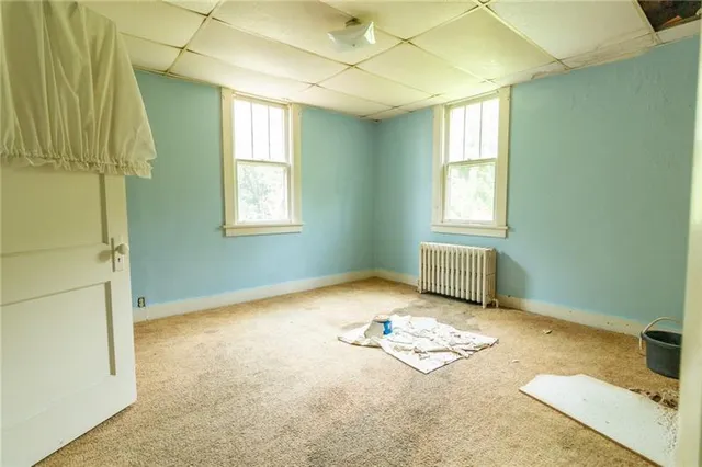 an empty room with windows