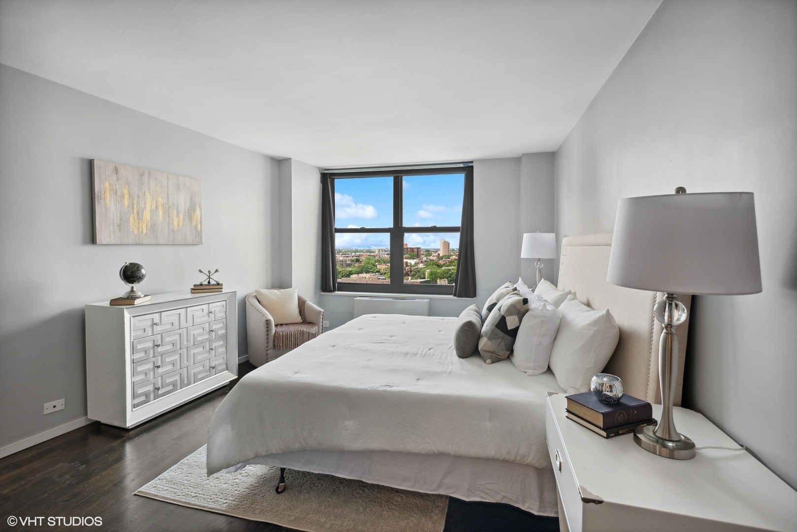 3430 North Lake Shore Drive, Unit 14P Chicago, IL 60657 - Photo 12 of 18 a bedroom with a bed and a window