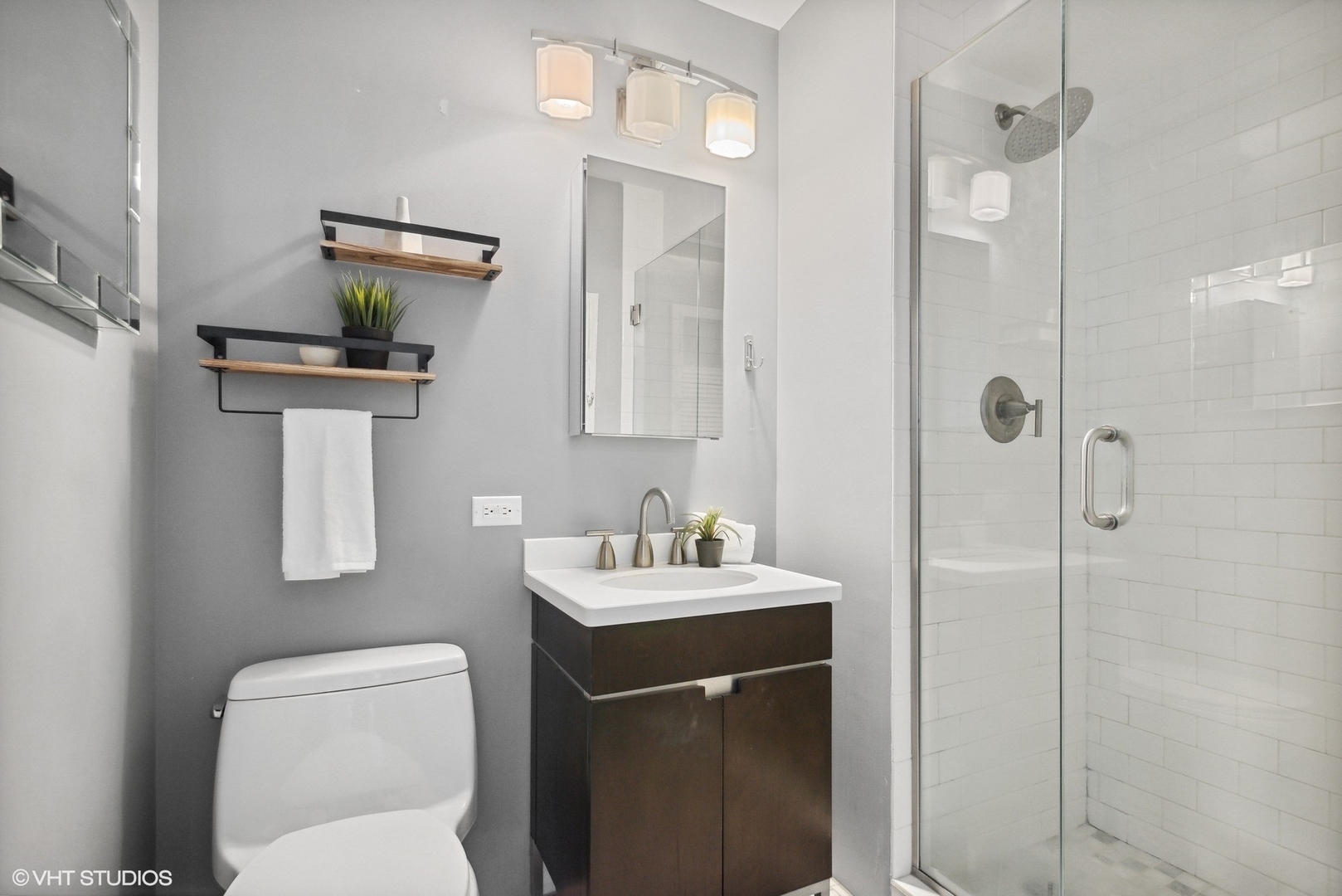 3430 North Lake Shore Drive, Unit 14P Chicago, IL 60657 - Photo 17 of 18 a bathroom with a sink toilet and shower