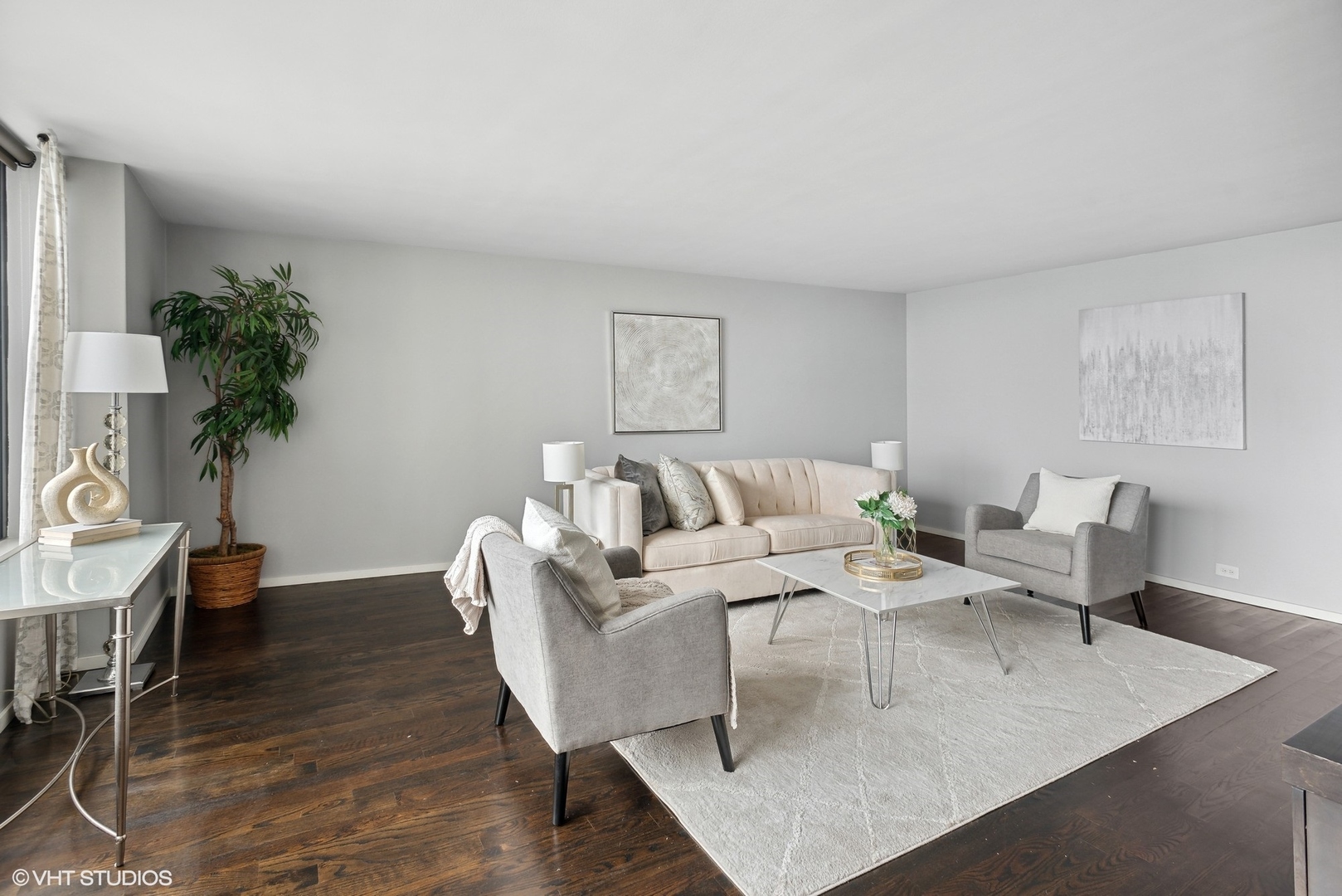 3430 North Lake Shore Drive, Unit 14P Chicago, IL 60657 - Photo 6 of 18 a living room with furniture rug and wooden floor
