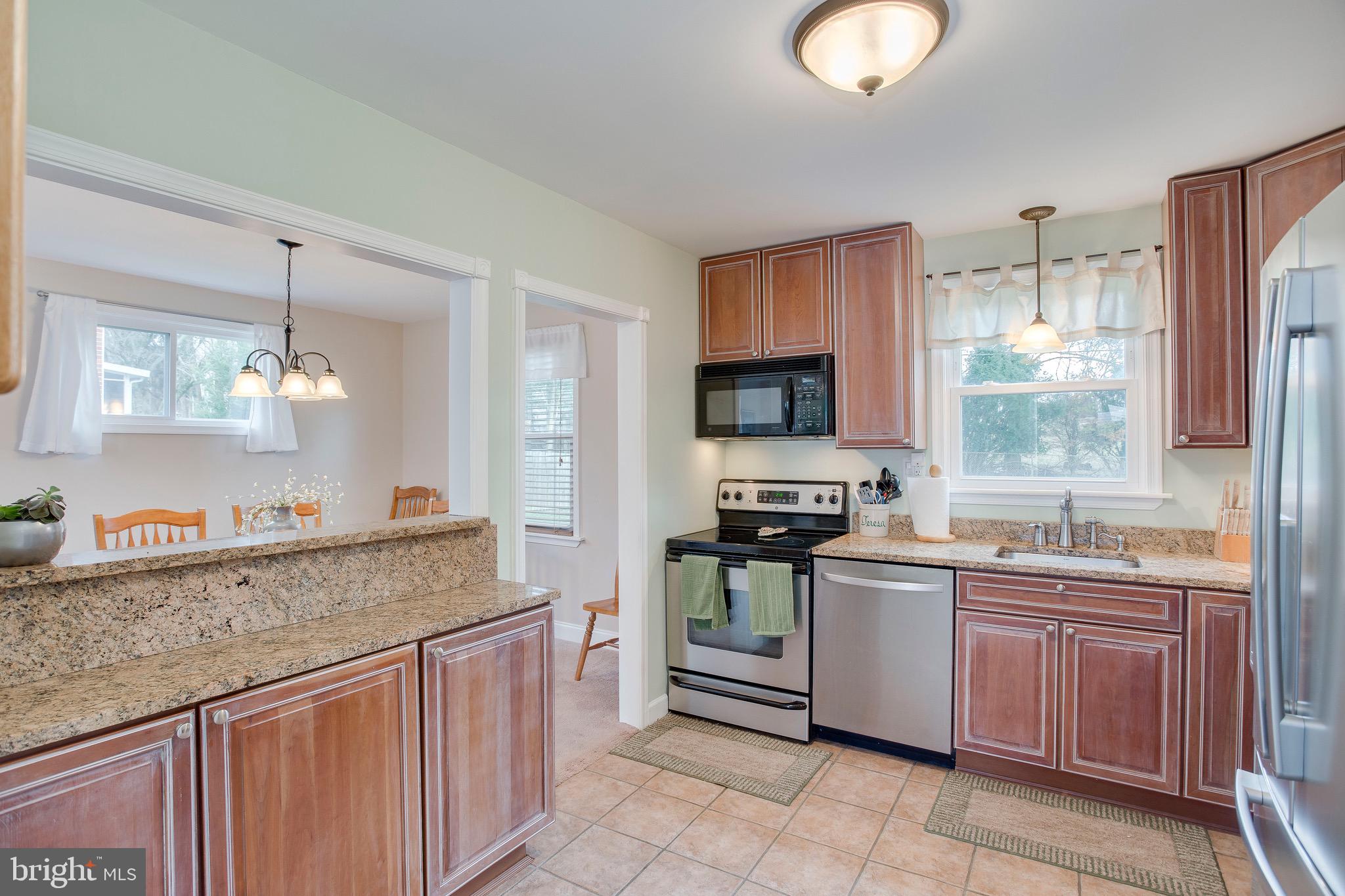 1913 Rollingwood Road Baltimore, MD 21228 - Photo 15 of 33 Updated tile flooring, new lighting in kitchen