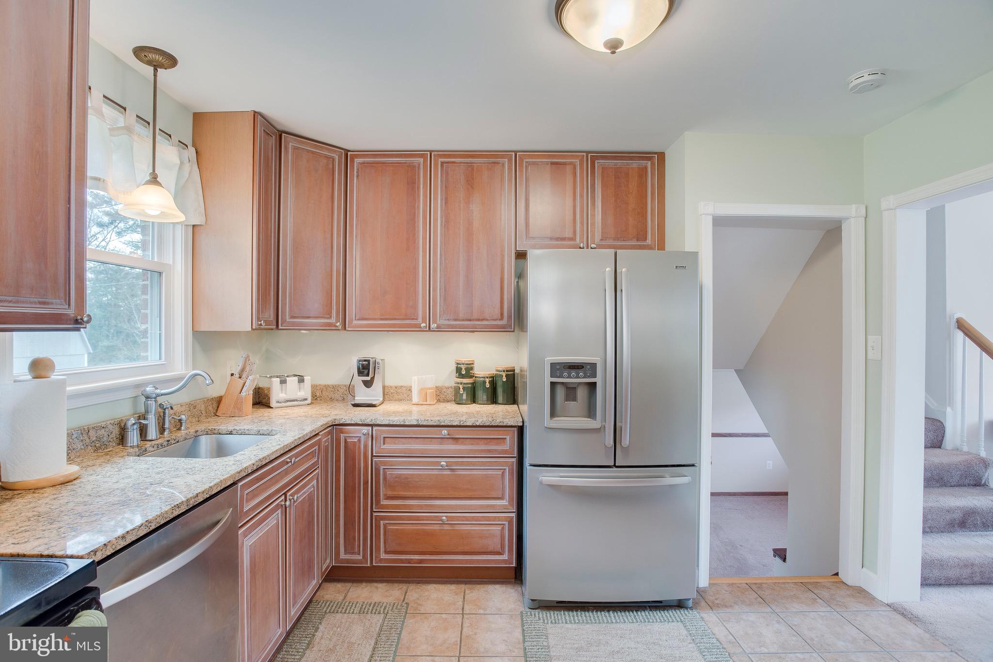 1913 Rollingwood Road Baltimore, MD 21228 - Photo 17 of 33 New lighting fixtures add to this updated kitchen