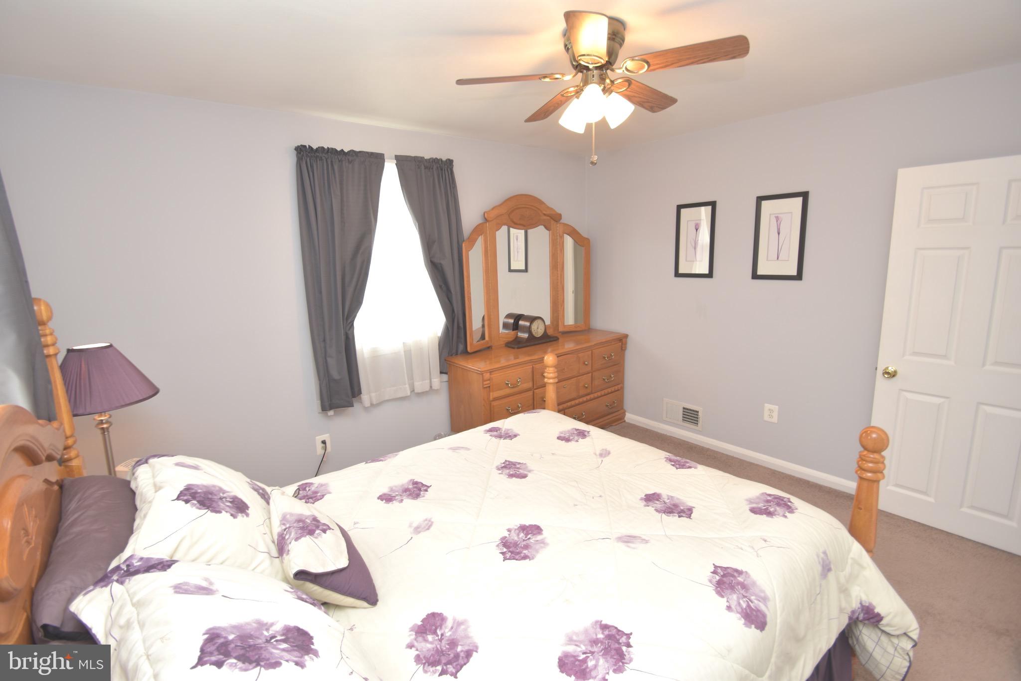 1913 Rollingwood Road Baltimore, MD 21228 - Photo 29 of 33 Six panel doors, ceiling fan with light