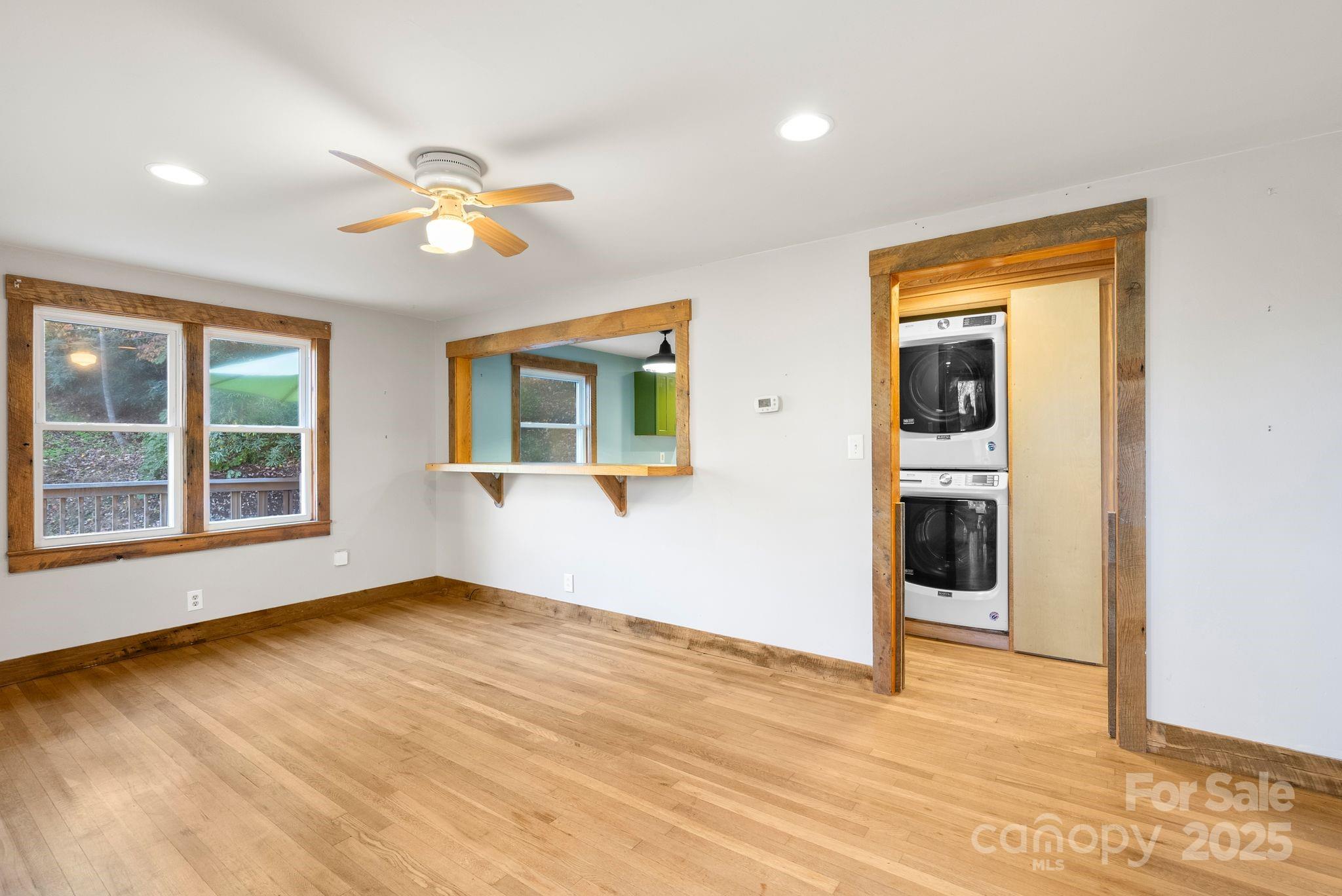 456 Rector Corner Road Marshall, NC 28753 - Photo 11 of 29 a view of an empty room with a window