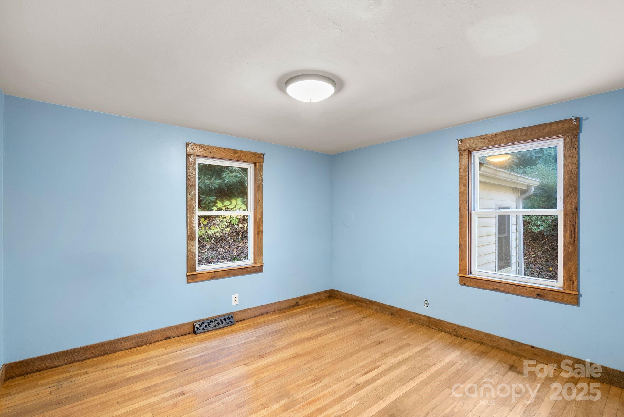 456 Rector Corner Road Marshall, NC 28753 - Photo 21 of 29 a view of an empty room with a window