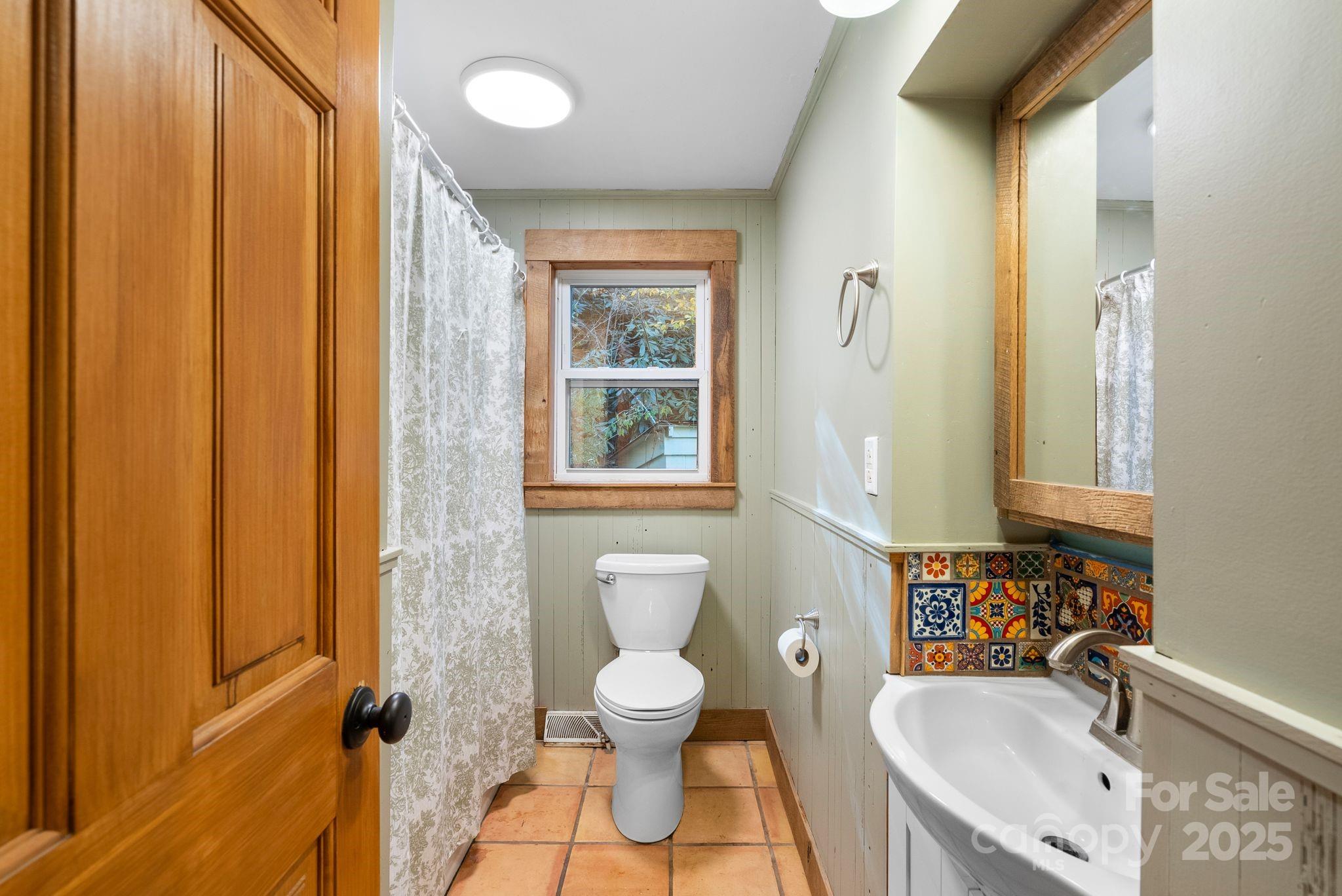 456 Rector Corner Road Marshall, NC 28753 - Photo 25 of 29 a bathroom with a sink toilet and shower