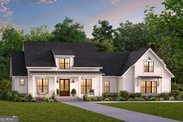 front view of a house with a yard