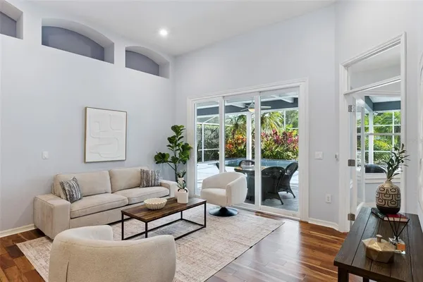 a dining room with furniture and window
