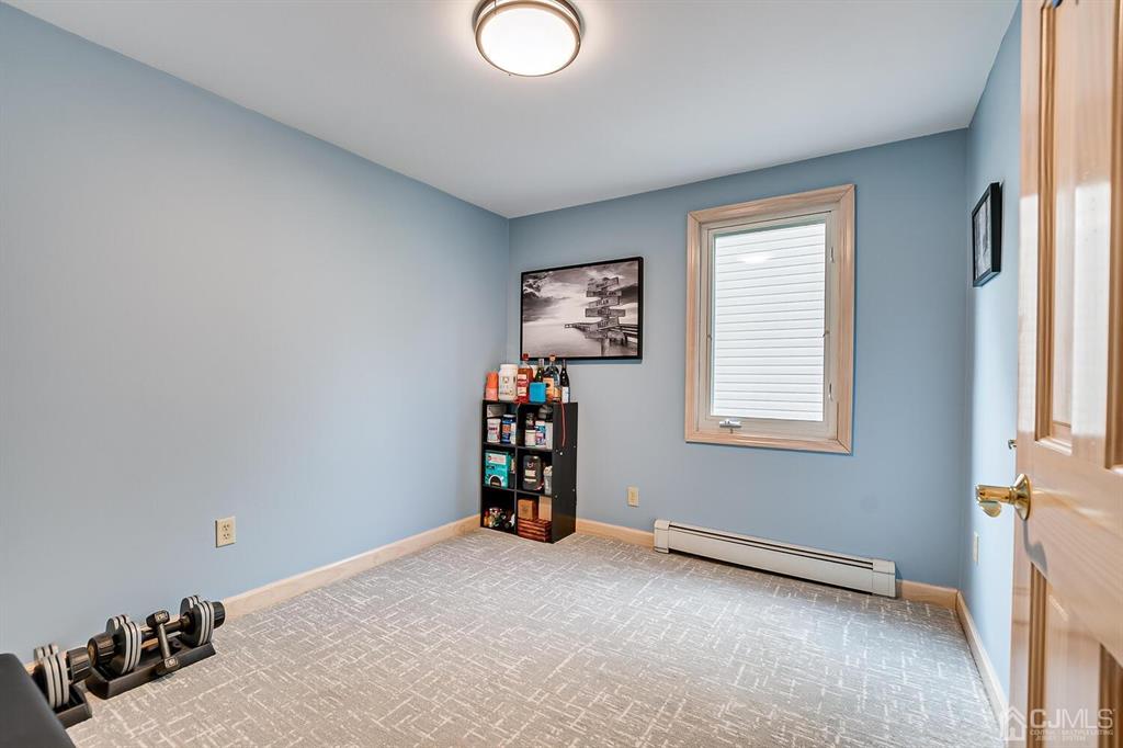 13 Highfield Road Colonia, NJ 07067 - Photo 19 of 42 a view of a livingroom with a window