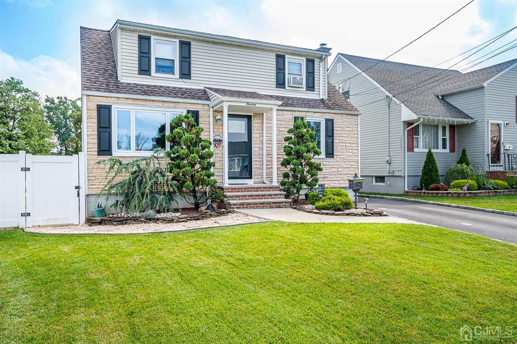 13 Highfield Road Colonia, NJ 07067 - Photo 2 of 42 front view of a house with a yard