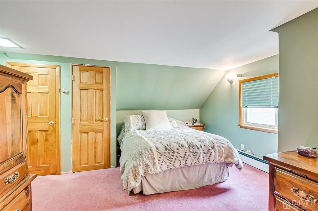13 Highfield Road Colonia, NJ 07067 - Photo 21 of 42 a bedroom with a bed and window
