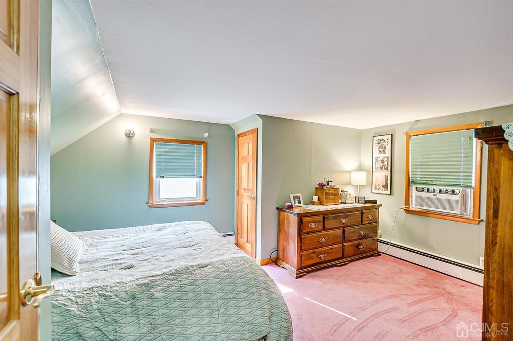 13 Highfield Road Colonia, NJ 07067 - Photo 22 of 42 a bedroom with a bed and a window