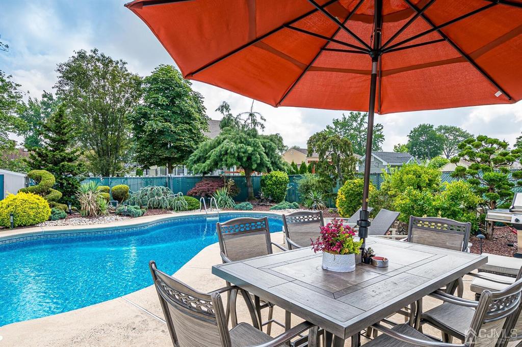 13 Highfield Road Colonia, NJ 07067 - Photo 30 of 42 a view of backyard of house with seating space
