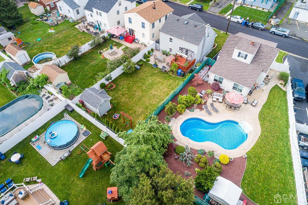 13 Highfield Road Colonia, NJ 07067 - Photo 38 of 42 aerial view of residential house with outdoor space and swimming pool