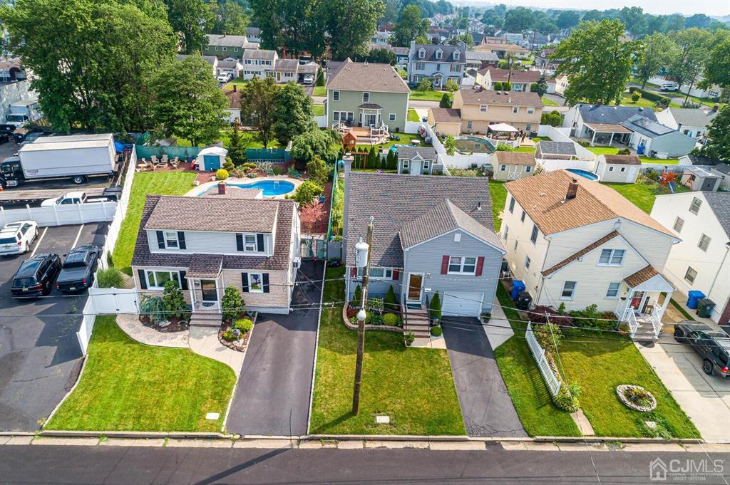 13 Highfield Road Colonia, NJ 07067 - Photo 39 of 42 a view of multiple houses with yard