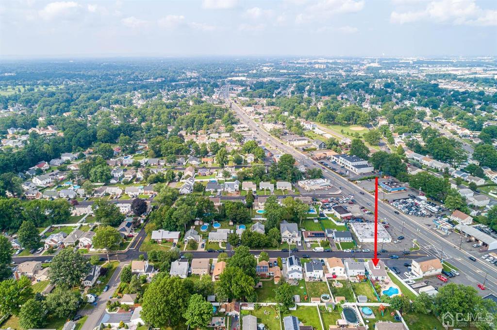 13 Highfield Road Colonia, NJ 07067 - Photo 40 of 42 an aerial view of city and lake