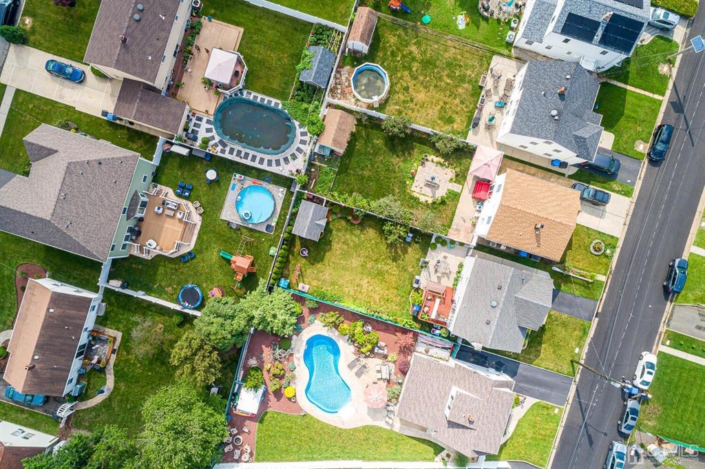 13 Highfield Road Colonia, NJ 07067 - Photo 4 of 42 an aerial view of residential houses with outdoor space and parking