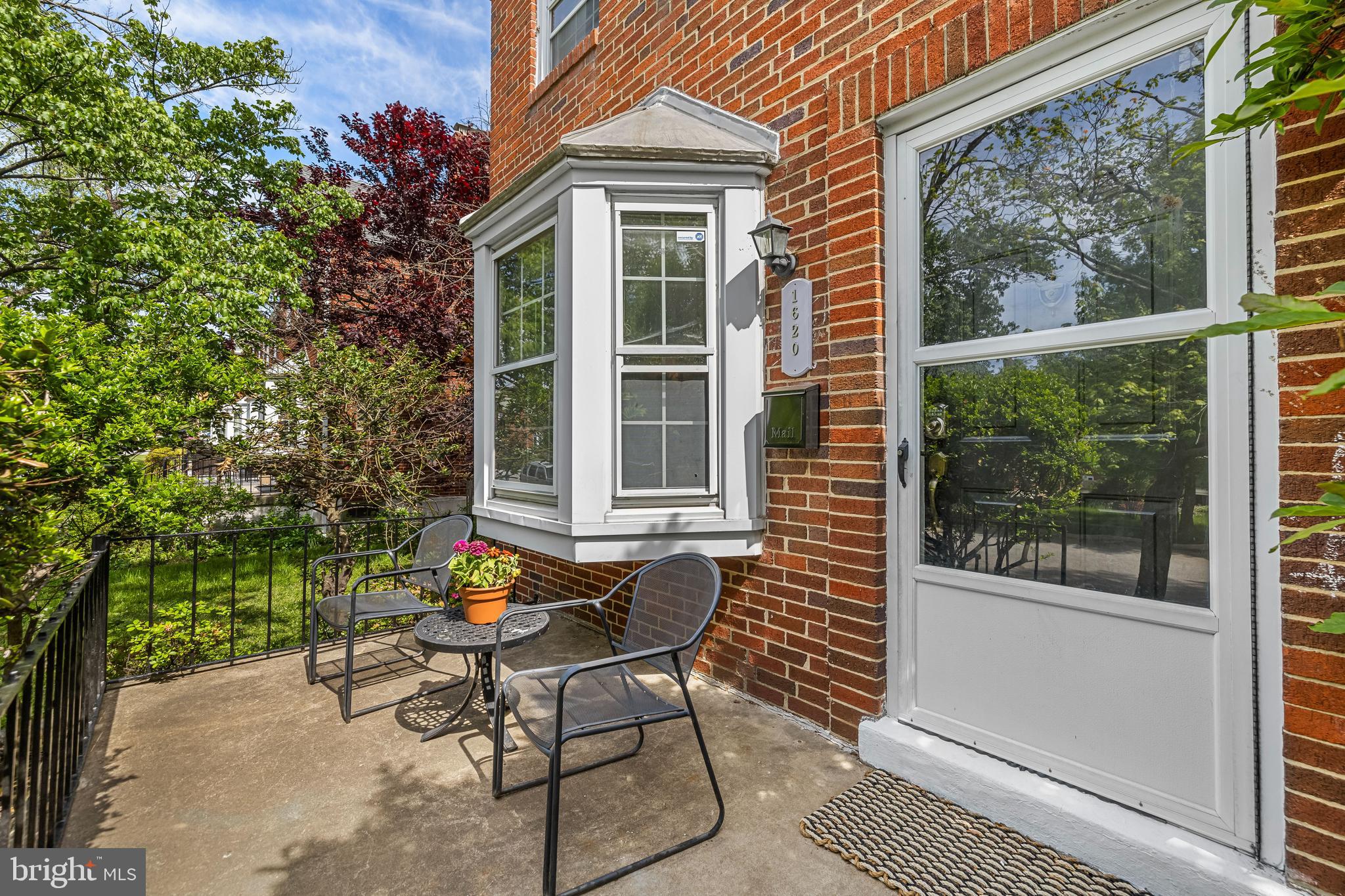 1620 Hardwick Road Towson, MD 21286 - Photo 2 of 38 a patio with table and chairs and potted plants