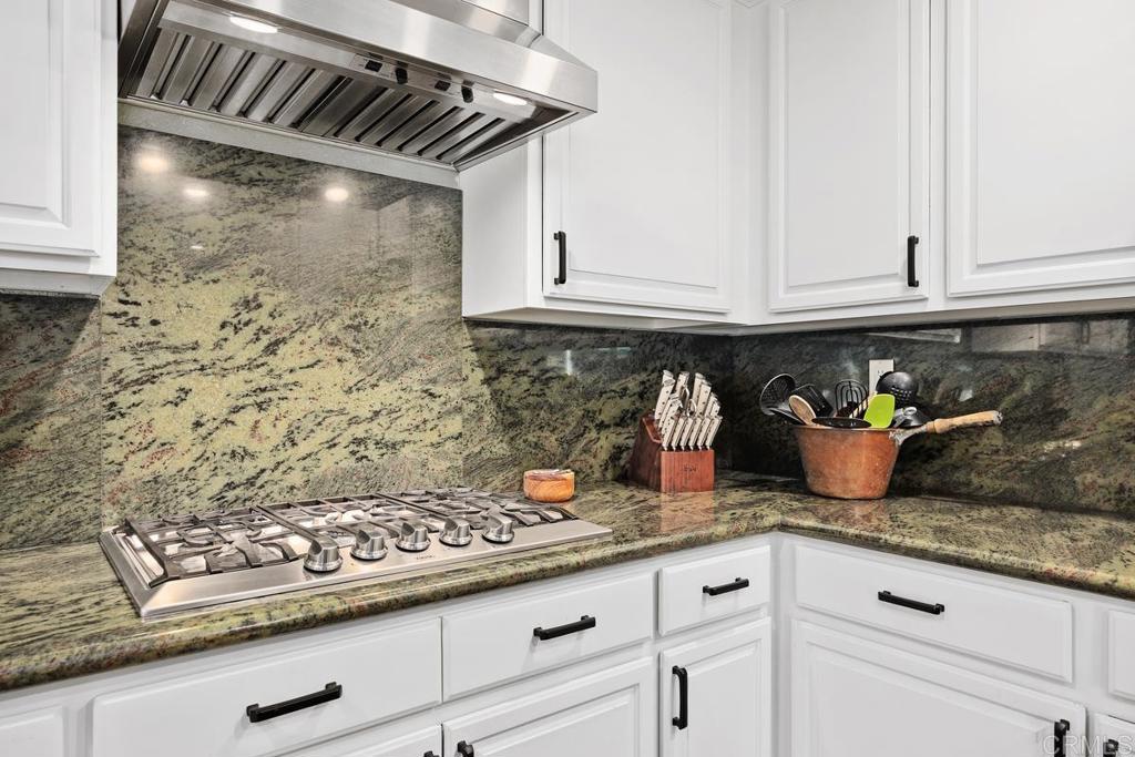 3112 Del Rey Avenue Carlsbad, CA 92009 - Photo 12 of 34 a kitchen with an oven a cabinets and a counter top space