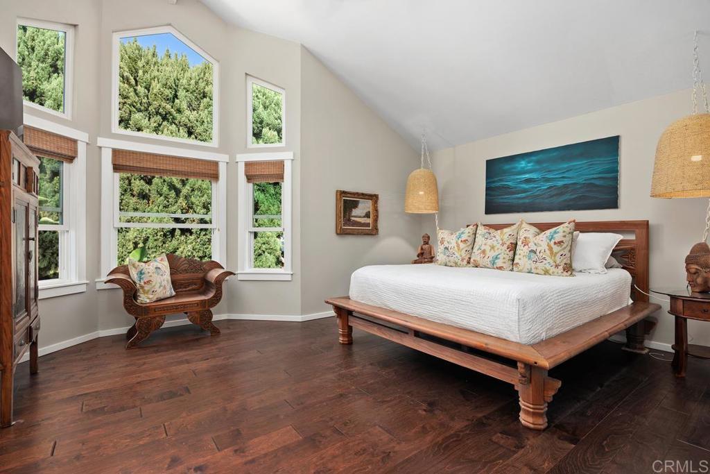 3112 Del Rey Avenue Carlsbad, CA 92009 - Photo 22 of 34 a bedroom with a bed and large window