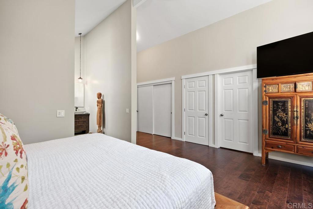 3112 Del Rey Avenue Carlsbad, CA 92009 - Photo 23 of 34 a bedroom with a bed and a flat screen tv