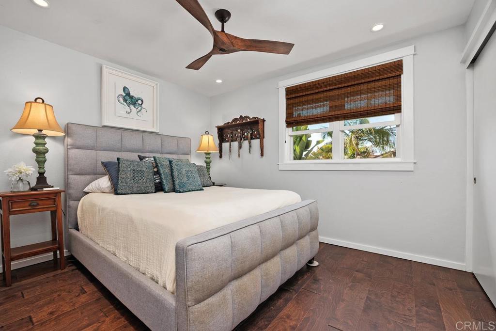 3112 Del Rey Avenue Carlsbad, CA 92009 - Photo 27 of 34 a bedroom with a large bed and a window