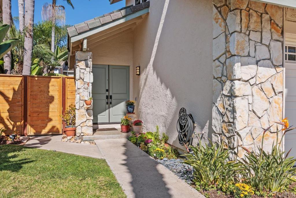 3112 Del Rey Avenue Carlsbad, CA 92009 - Photo 3 of 34 a front view of a house with garden