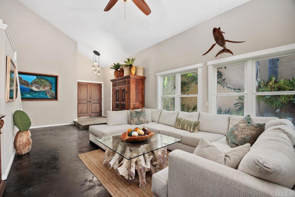 3112 Del Rey Avenue Carlsbad, CA 92009 - Photo 6 of 34 a living room with furniture and a large window