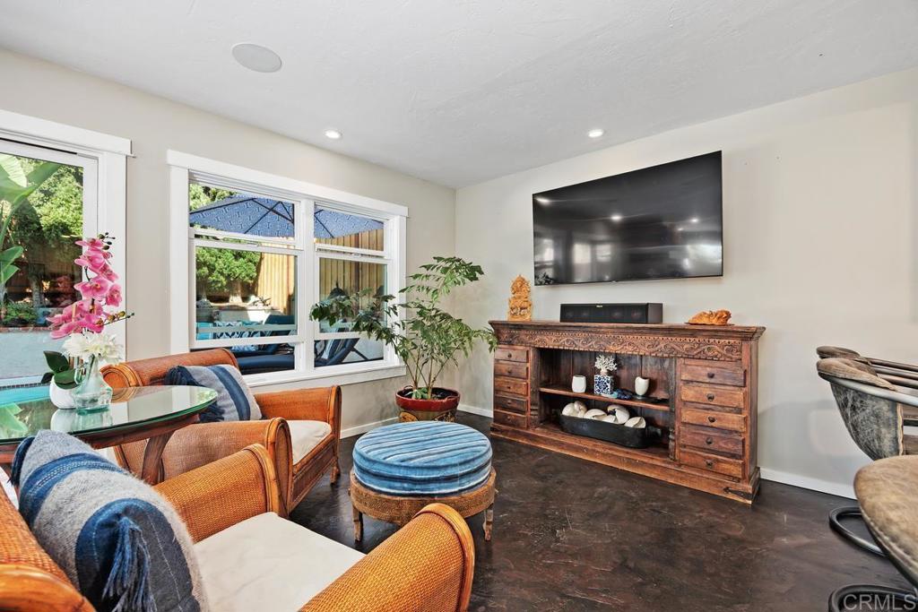 3112 Del Rey Avenue Carlsbad, CA 92009 - Photo 9 of 34 a living room with furniture and a flat screen tv