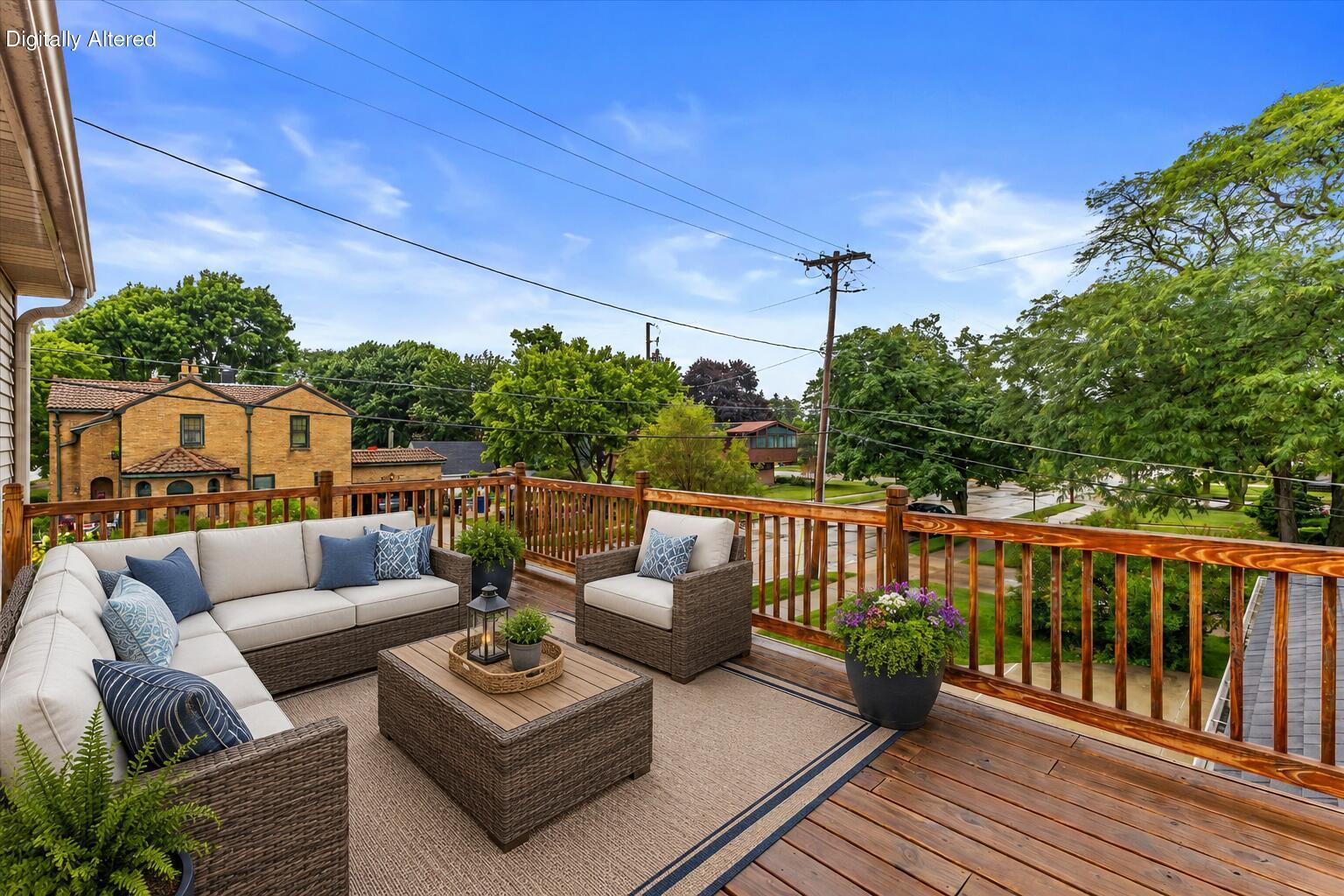 2925 North Main Street Racine, WI 53402 - Photo 11 of 23 Accessible directly from the primary suite, this oversized deck offers the perfect setting for morning coffee, evening sunsets, or relaxing outdoors.